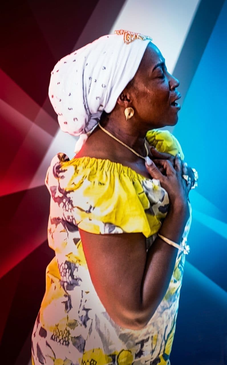 Man in prayer portrait three